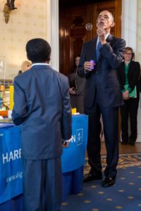 President Barack Obama talks with students about their science projects as he tours the White House Science Fair in the Blue Room of the White House, April 13, 2016. (Official White House Photo by Pete Souza)
